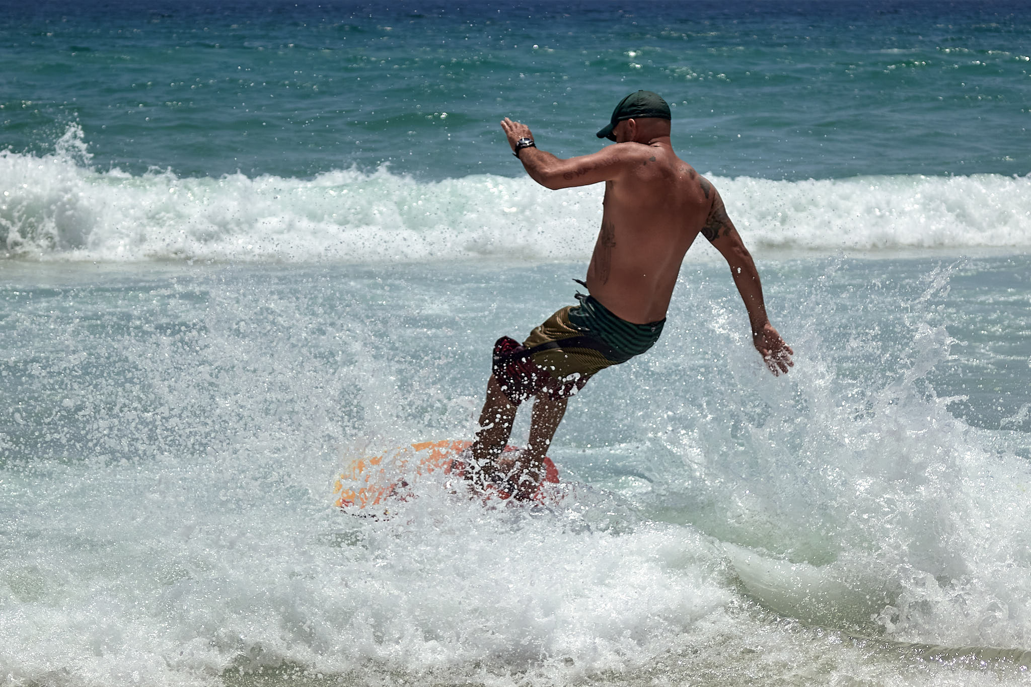 Wakeboarder on the beach in Destin, FL.